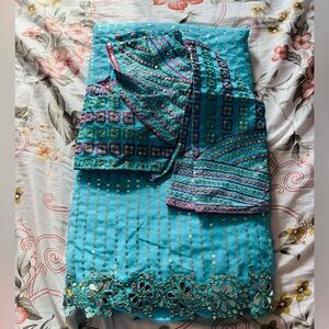 Vibrant Indian blue and Red Embellished Saree